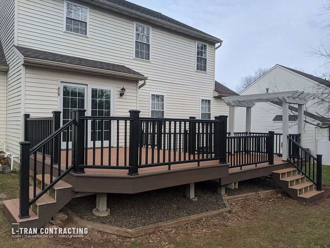Custom deck with pergola built by L-Tran Contracting