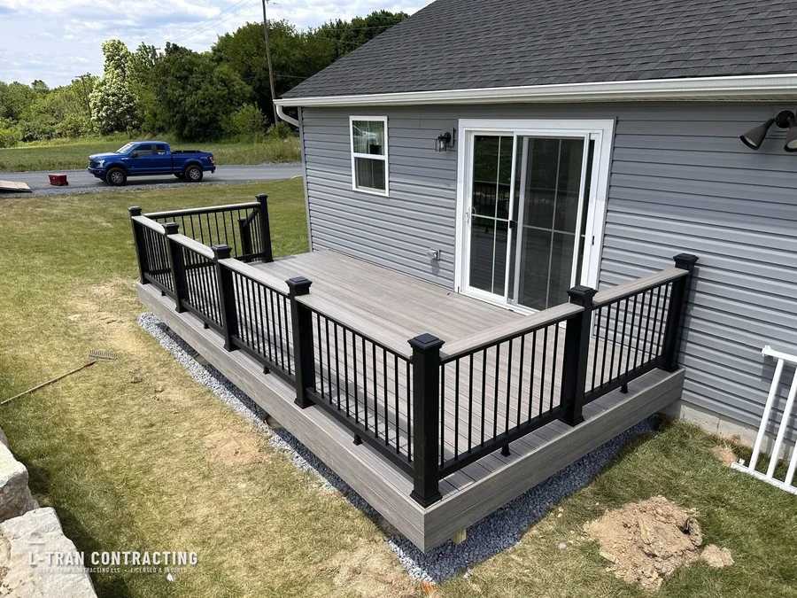 New deck construction with gray composite decking