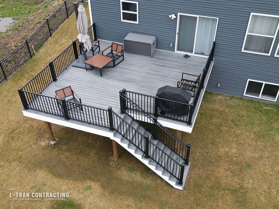 Elevated deck with staircase and grill station