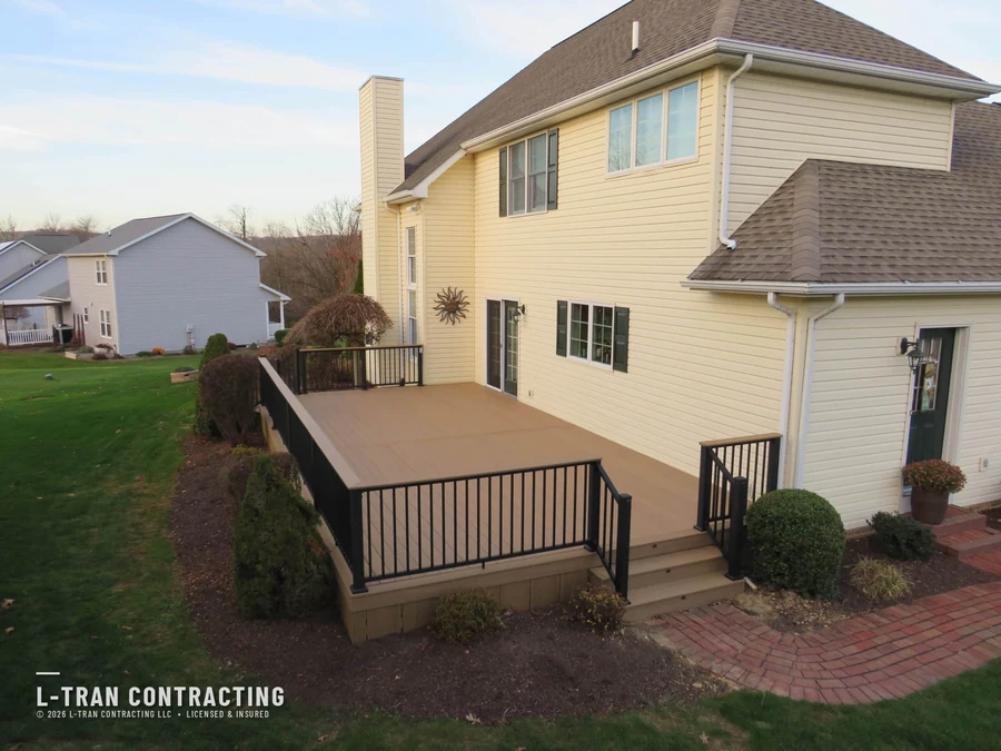 Spacious backyard deck addition on a two-story home