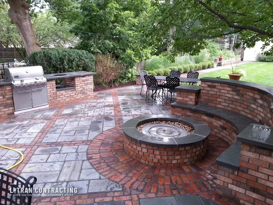 Brick patio with built-in fire pit and curved seating wall