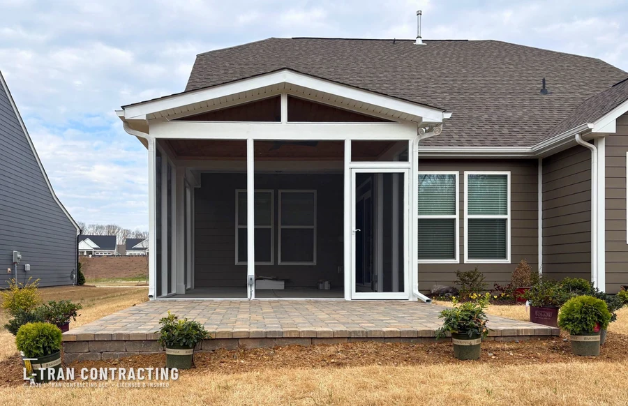 New construction screened porch with paver patio